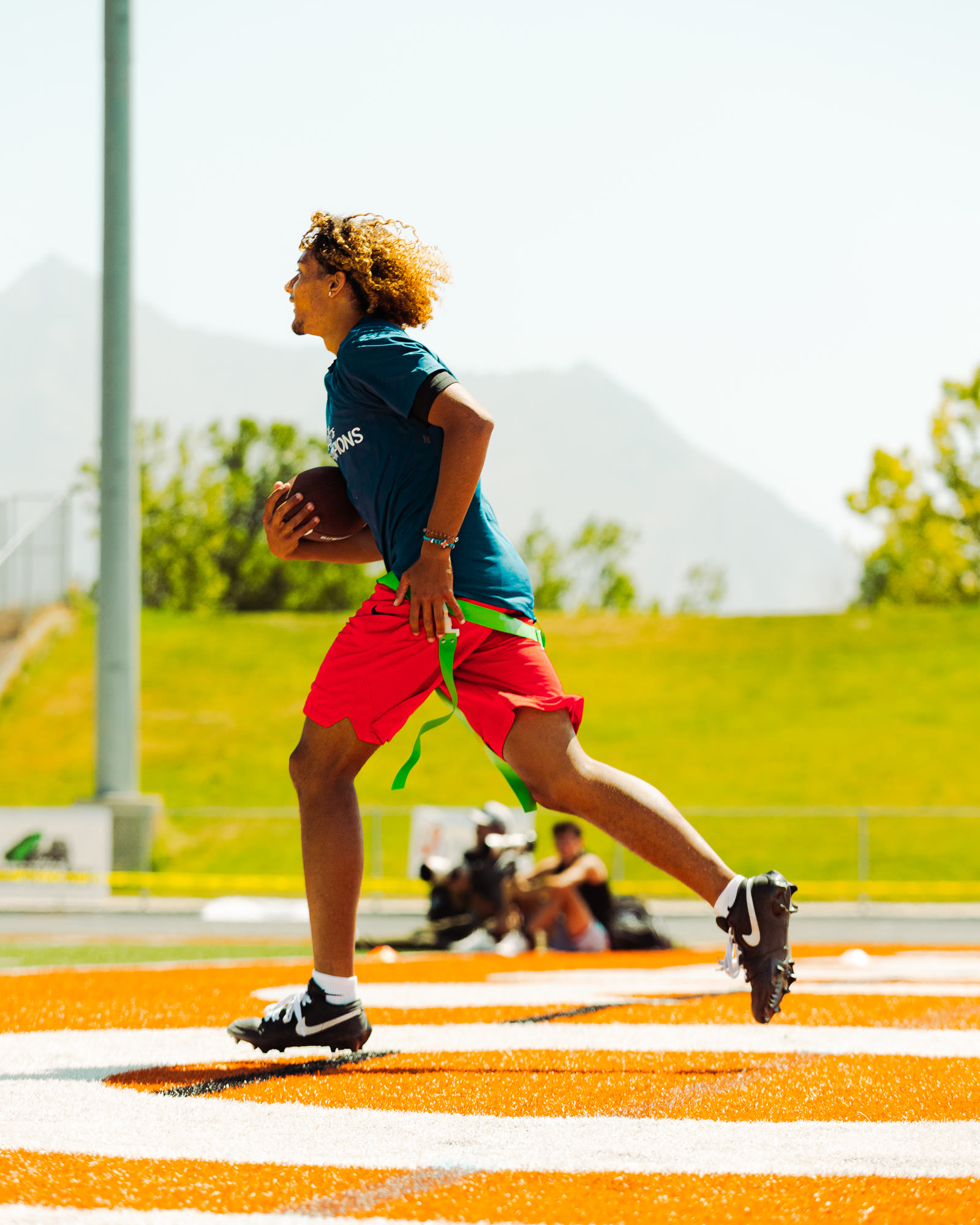 End zone sprint with mountains in background