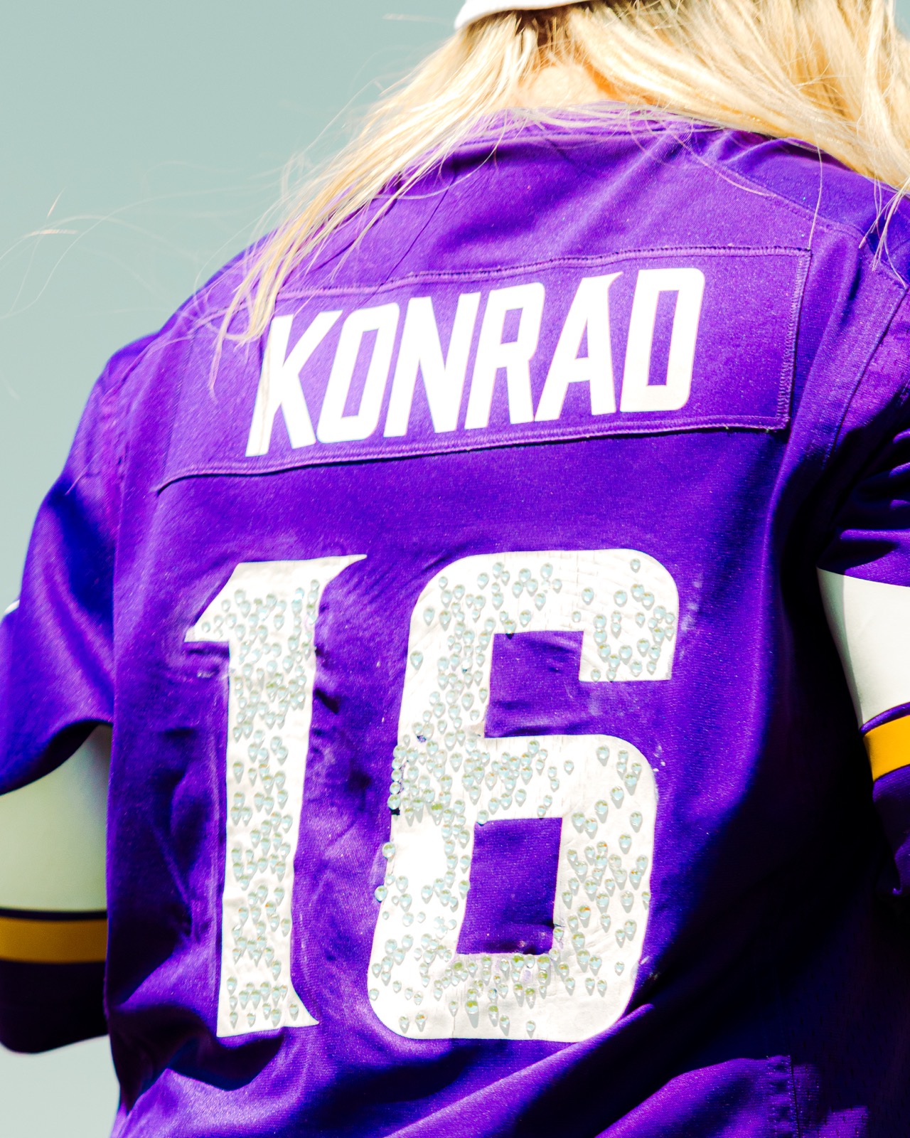 Purple jersey detail with bedazzled numbers