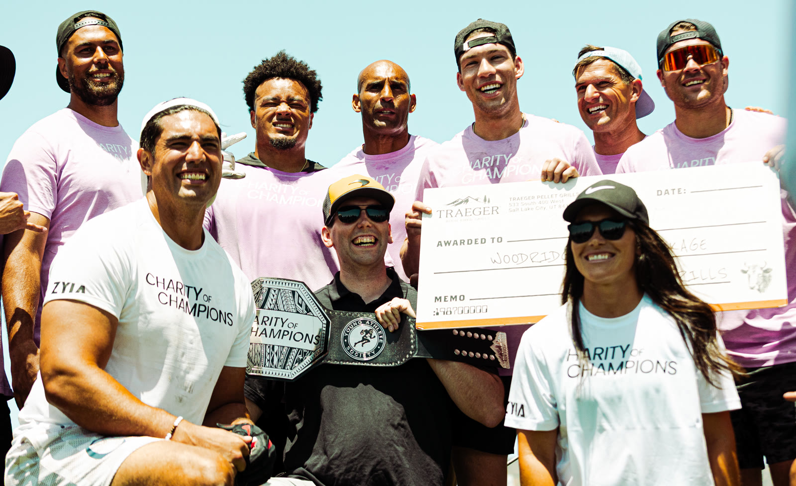 Big check charity presentation and trophy celebration